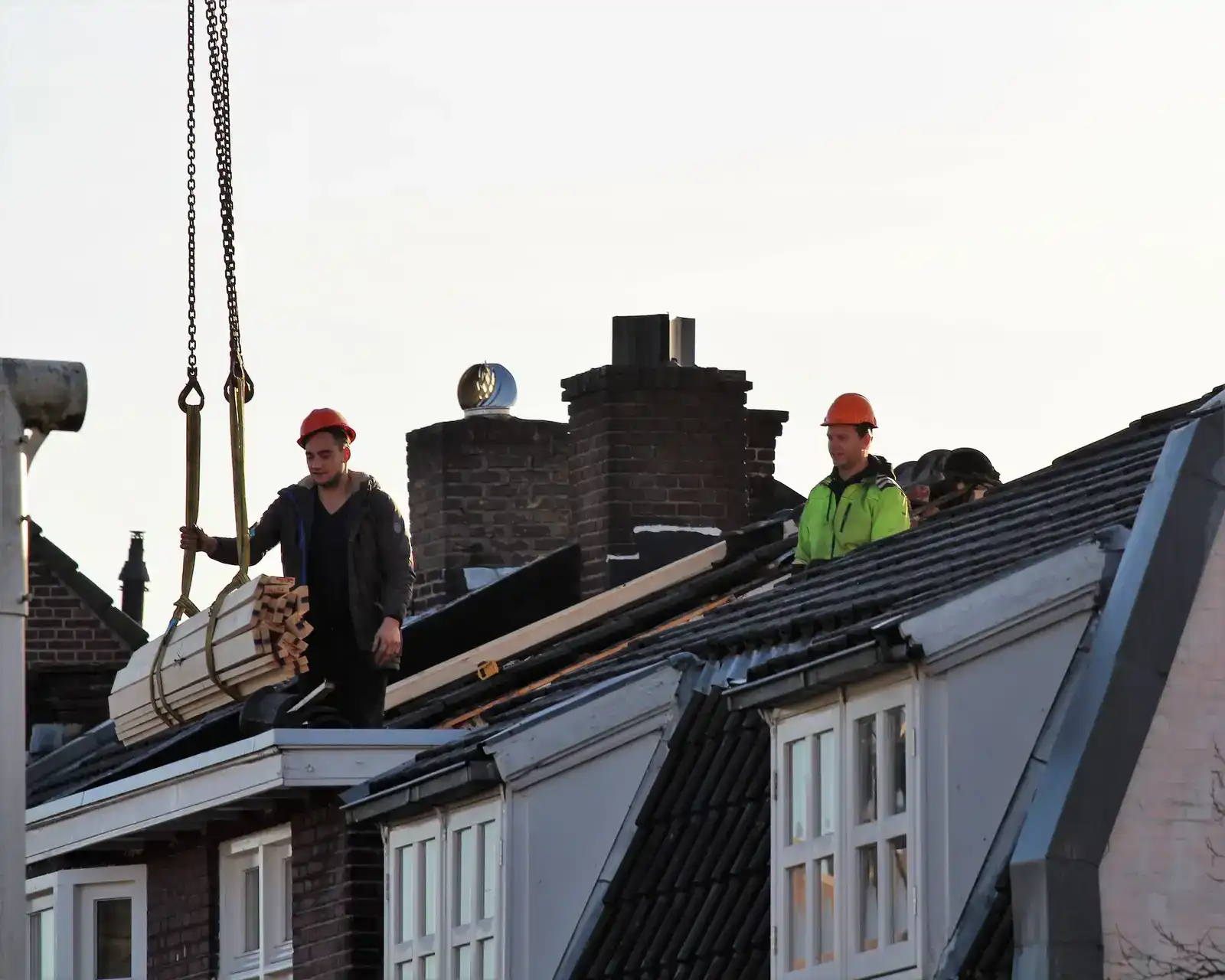 The Ridgeline crew working on a rooftop